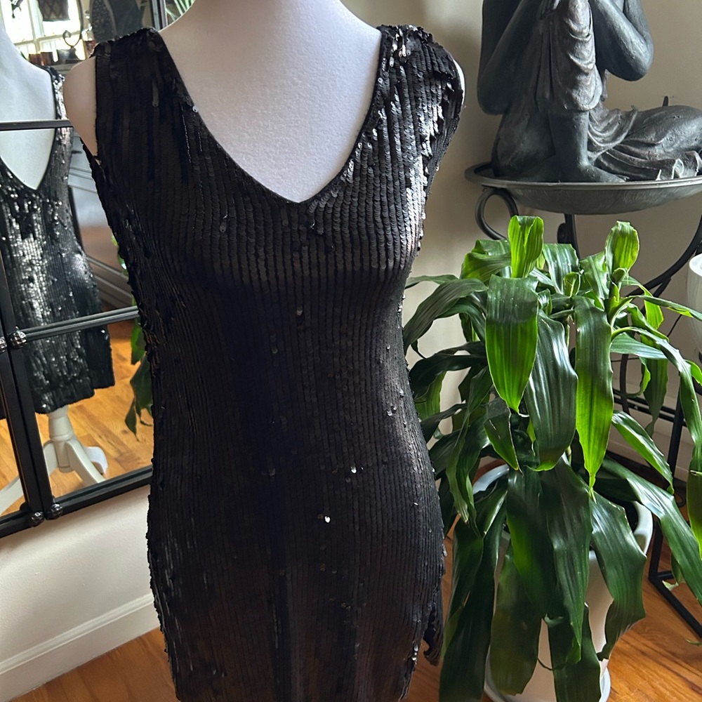 Free people midnight black sequin blouse.
The Holidays are Coming ✨